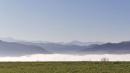 appenino reggiano con sole e nebbia