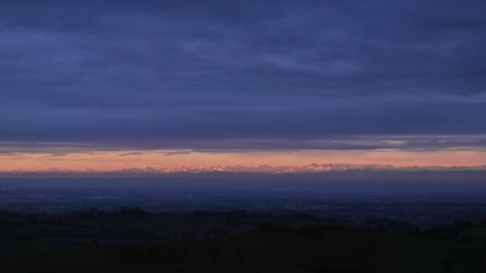 alpi al tramonto da vezzano sul crostolo